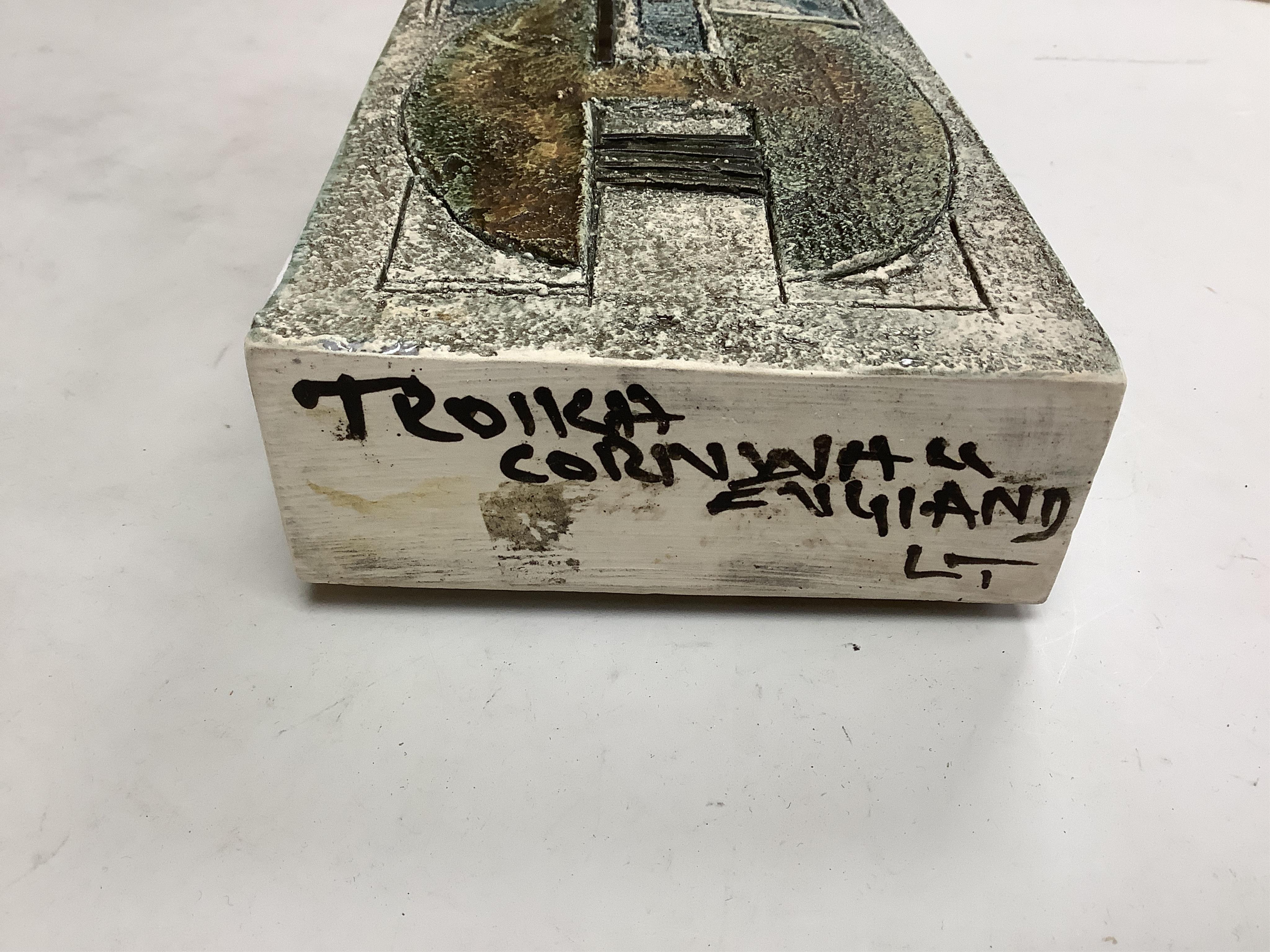 A Troika vase by Linda Taylor, decorated in relief with an abstract design, signed to the base, 17cm high